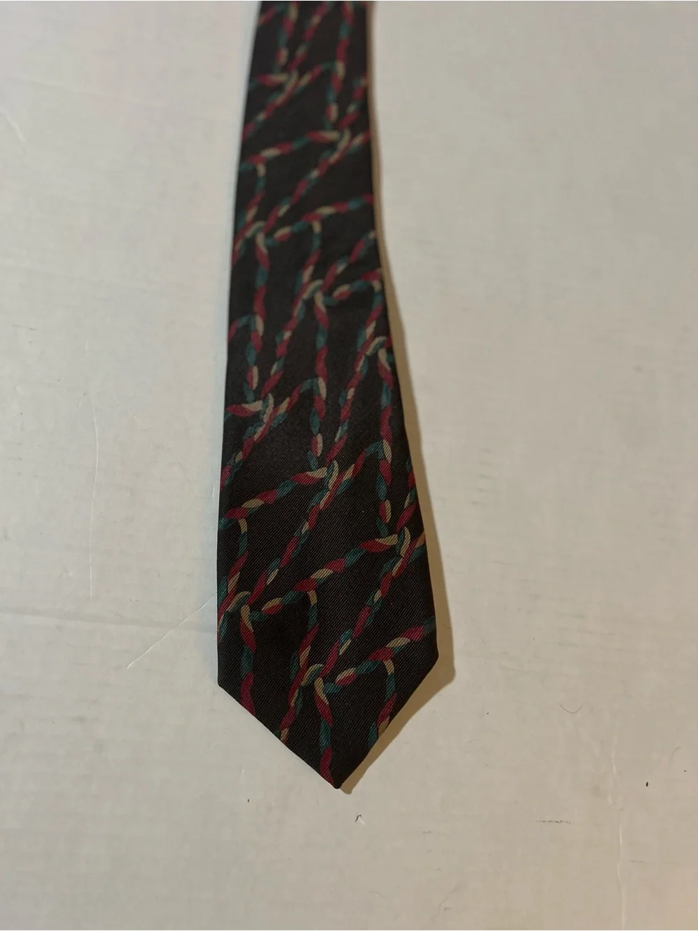 Vintage Giorgio Armani men’s necktie featuring an abstract braided-rope pattern